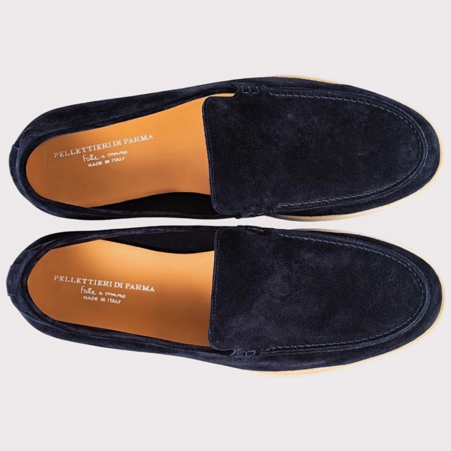     Top view men’s loafers leather lining navy suede